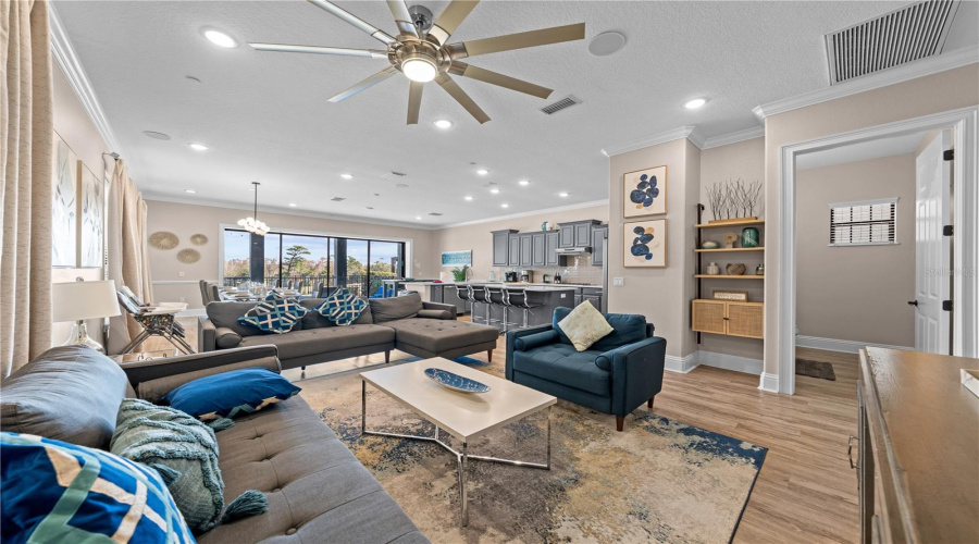 living room with view of kitchen/dining and breakfast nook