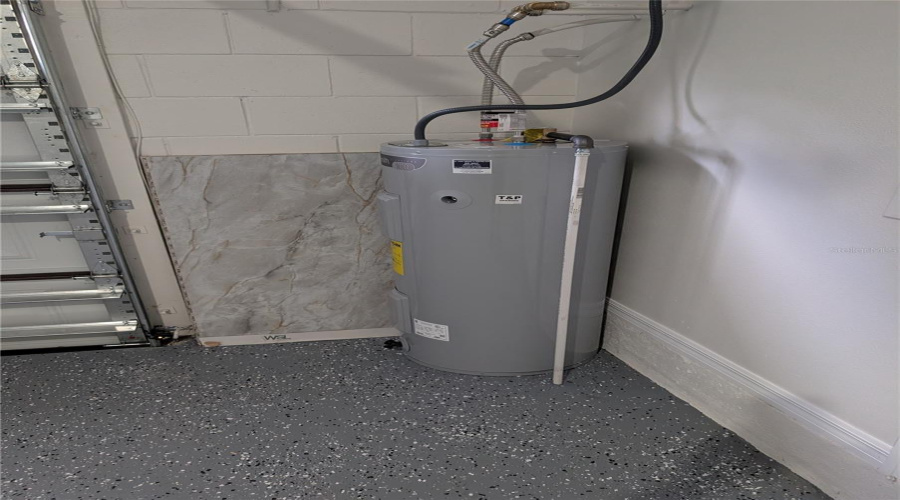 HOT WATER TANK IN GARAGE