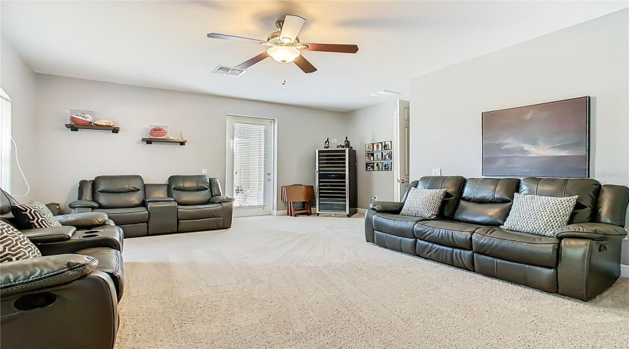 Man Cave/Flex Room has door to outside