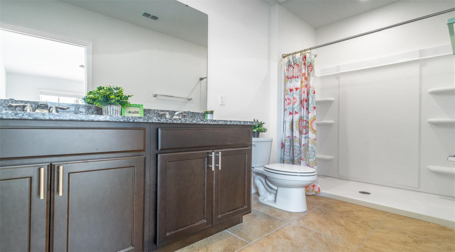 Primary bathroom with walk-in shower