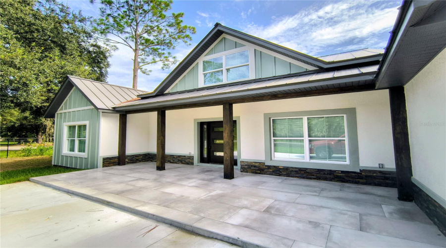 Closeup of front entrance and tiled