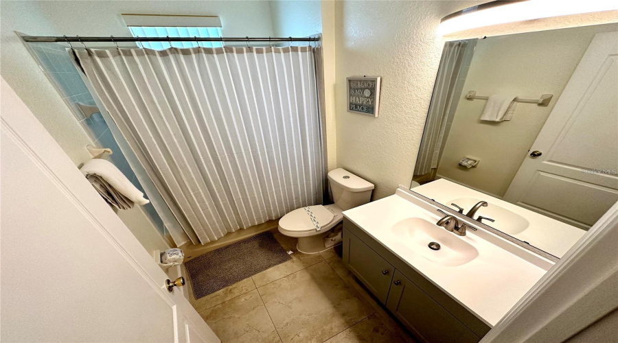 Bathroom 3 with shower/tub combo and single vanity
