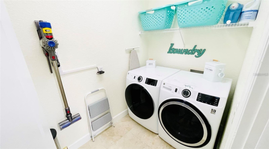 Laundry Room with New Front Loader Washer and Dryer