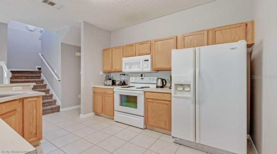 Kitchen features White Appliances