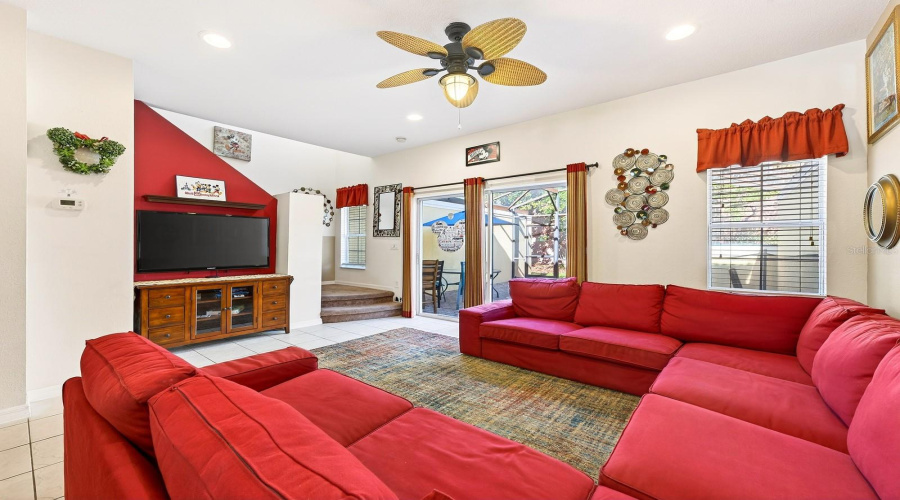 The generous Dining area and Living Room are filled with NATURAL LIGHT, thanks to sliding glass doors that lead to your own PRIVATE OUTDOOR RETREAT.