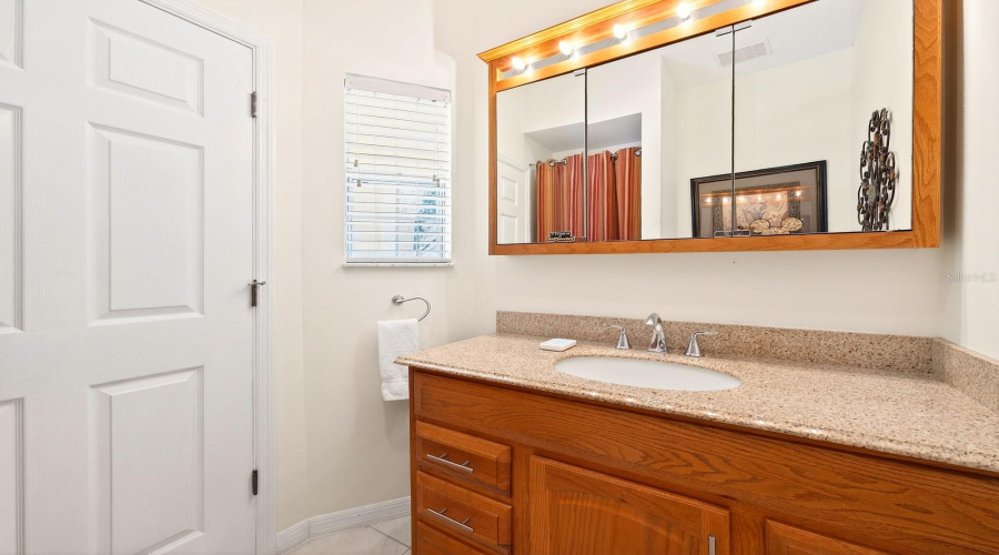 A CONVENIENT HALF BATH completes the main floor.