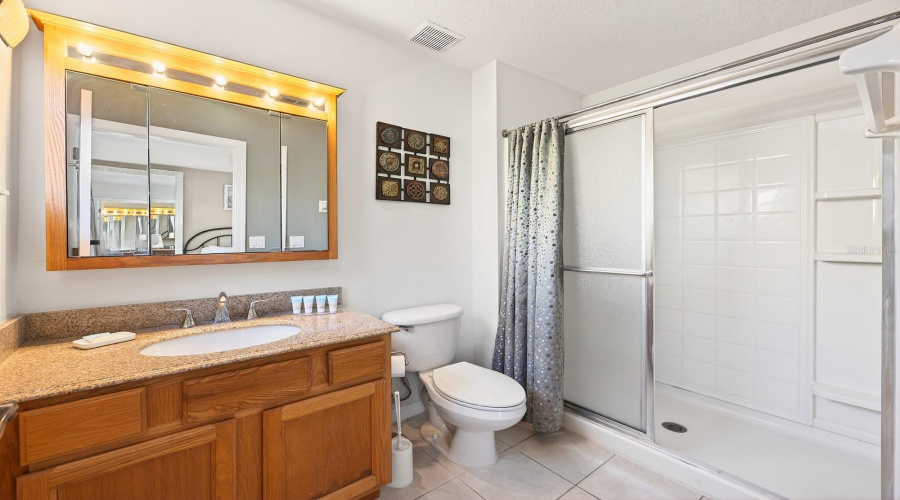 Upstairs, the spacious Primary Suite features a large EN SUITE BATH, creating a comfortable and relaxing retreat.