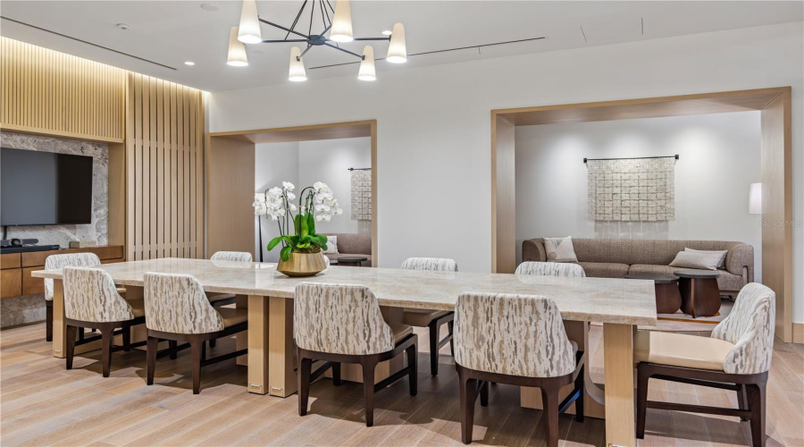 Florian Park Amenities: A Welcomed Arrival. The stage is set for your much-anticipated entrance. A porte-cochere will lead to the open-air lobby, staffed 24/7, so there’s always someone to welcome you home. You’ll delight in the instantly impressive space which features your Residential Services reception area, the resident’s lounge, inspired workspaces, flex rooms for events and a coffee bar.