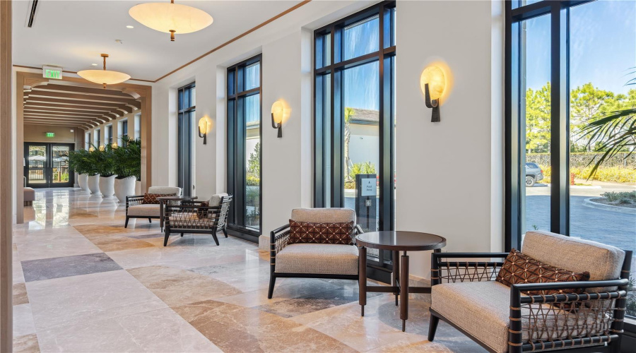 Florian Park Amenities: A Welcomed Arrival. The stage is set for your much-anticipated entrance. A porte-cochere will lead to the open-air lobby, staffed 24/7, so there’s always someone to welcome you home. You’ll delight in the instantly impressive space which features your Residential Services reception area, the resident’s lounge, inspired workspaces, flex rooms for events and a coffee bar.