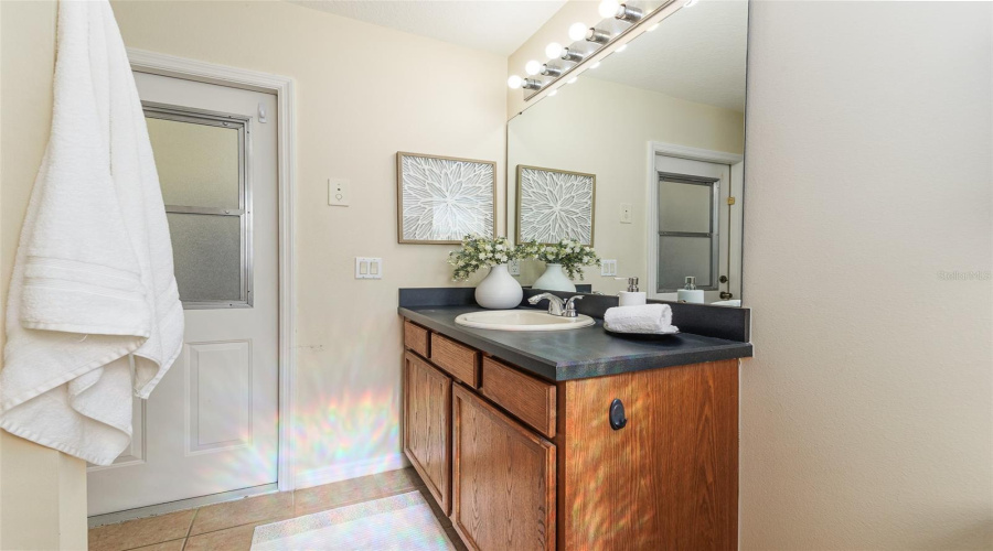 Primary Bathroom door to Pool