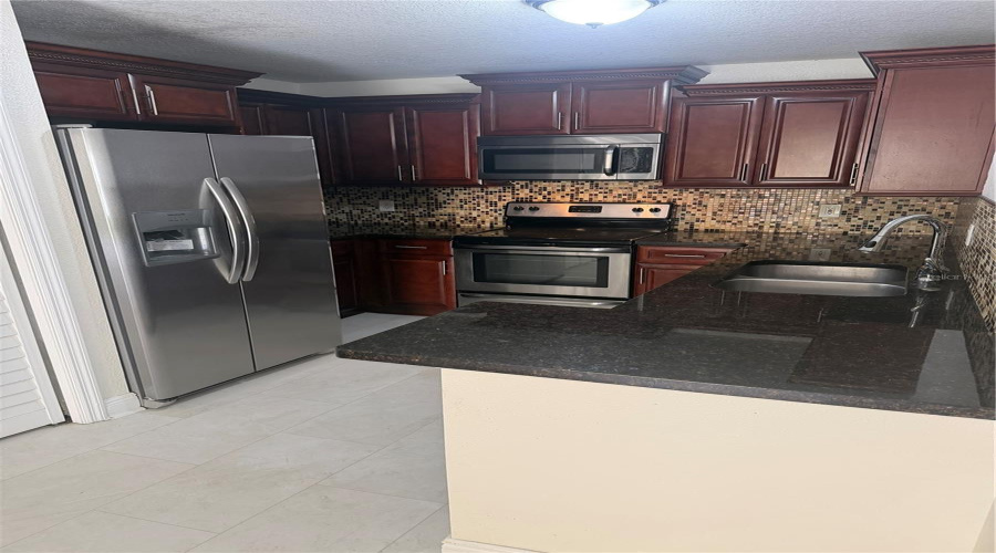KISSIMMEE, Florida 34746, 3 Bedrooms Bedrooms, ,2 BathroomsBathrooms,Residential,For Sale,CLUB CORTILE,0,MFRO6390196