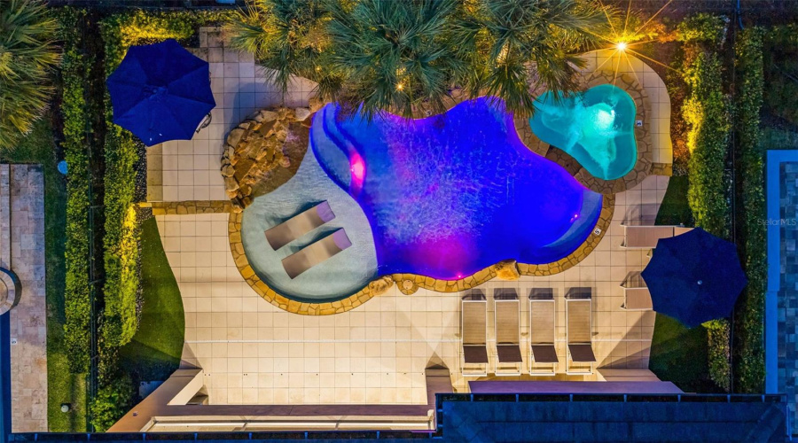 Aerial View of Pool Area at Night