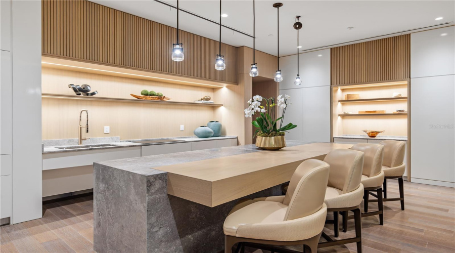 Florian Park Amenities: A Welcomed Arrival. The stage is set for your much-anticipated entrance. A porte-cochere will lead to the open-air lobby, staffed 24/7, so there’s always someone to welcome you home. You’ll delight in the instantly impressive space which features your Residential Services reception area, the resident’s lounge, inspired workspaces, flex rooms for events and a coffee bar.