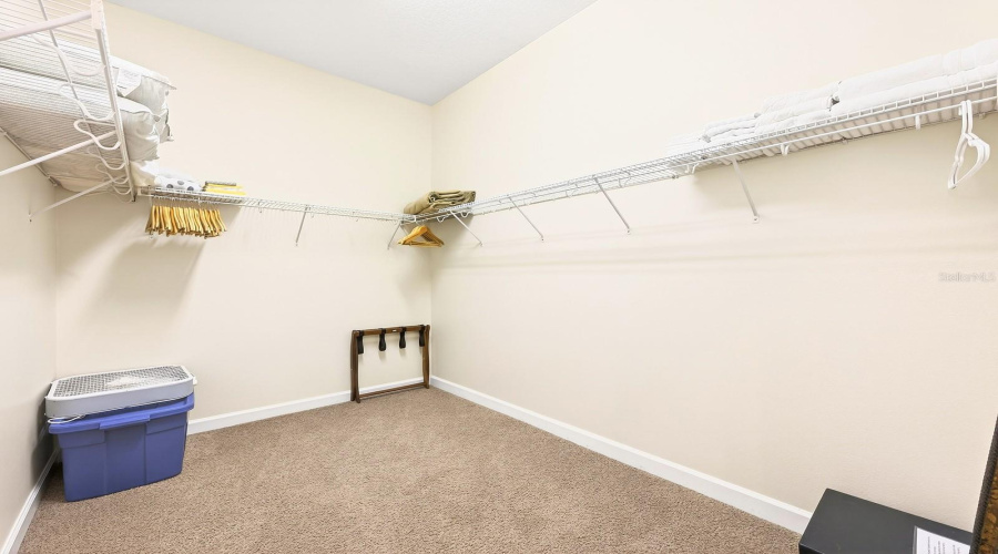 Primary suite walk-in closet.