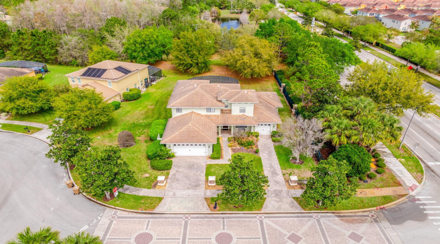 Oversized corner lot surrounded by beautiful mature trees.