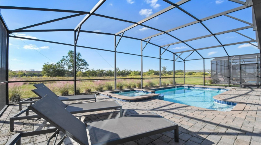 Screened-in pool + Spa