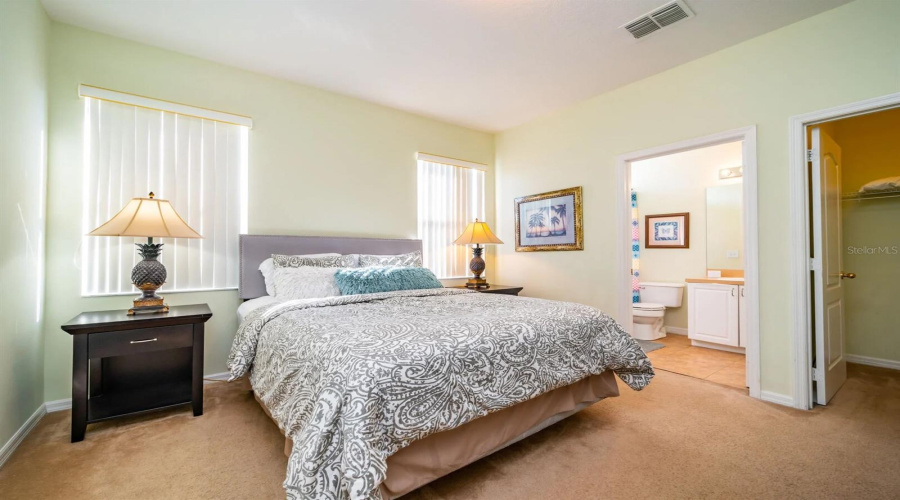 Second bedroom with ensuite bath and walk in closet