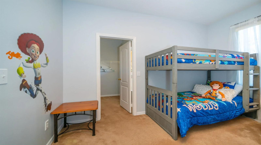 Bedroom 4 features a walk in closet