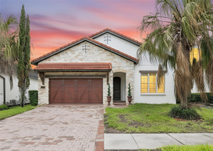 Welcome to this fully reimagined, single-story floor plan in the GUARD GATED COMMUNITY of Royal Cypress Preserve, just minutes from Walt Disney World!