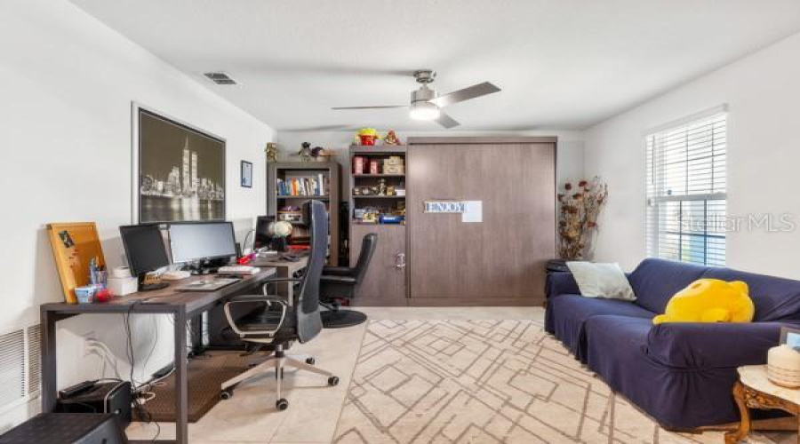 Flex space showing current arrangement and Murphy bed