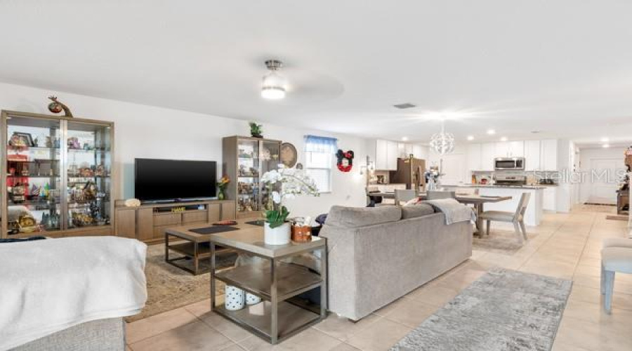 Living, dining and kitchen areas from exit to lanai