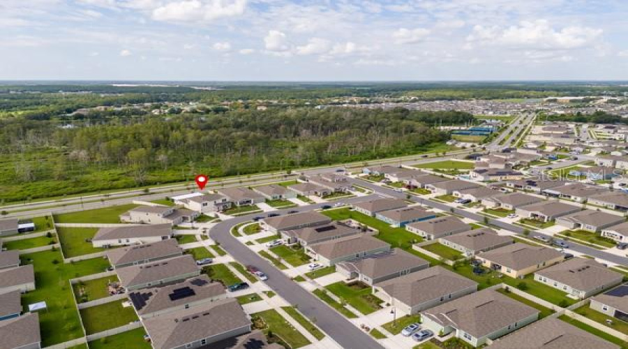 House in context with neighborhood