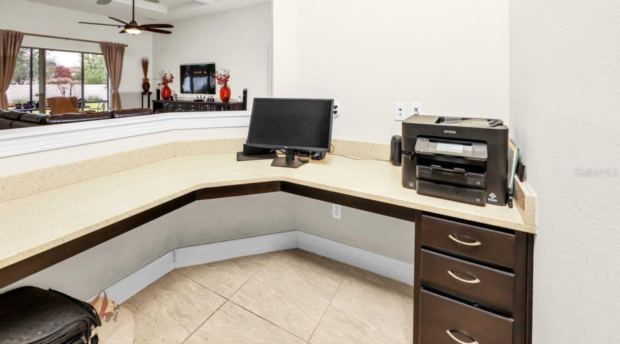 Built in desk behind kitchen area