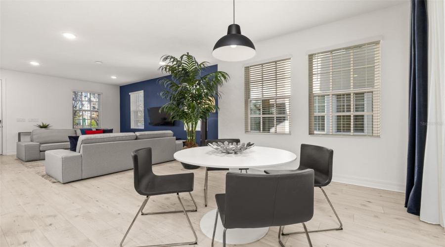 FORMAL DINING AREA OPENS TO KITCHEN