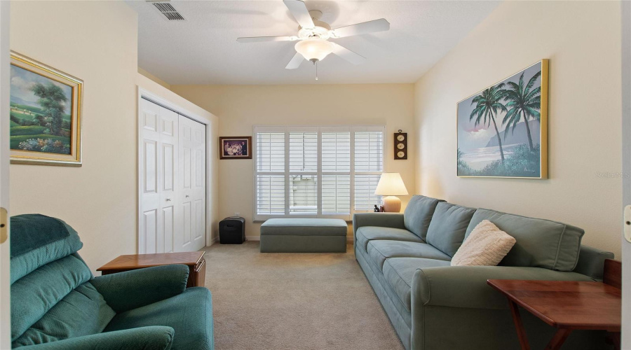Plantation shutters in middle bedroom