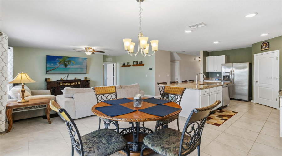 Open floor plan seamlessly flows from kitchen to living room