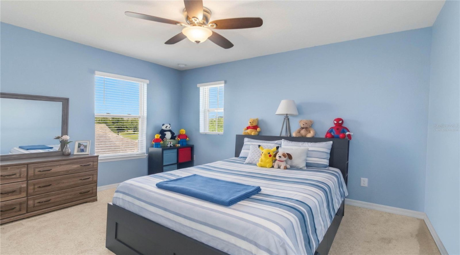 Bedroom 2 with large closet 2nd floor -virtually staged by removing some stuffed animals