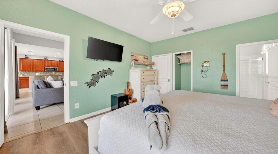Primary_bedroom_looking_into_family_roomkitchen