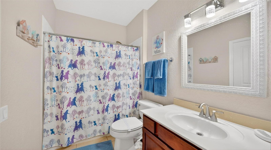 Bedroom_#4_en-suite_and_guest_bathroom_one_door_from_bedroom_and_another_door_from_hallway