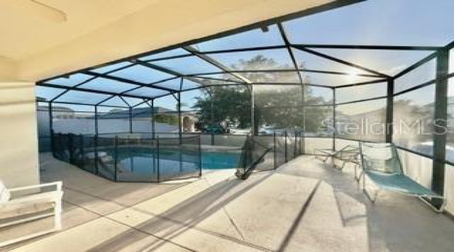 EXIT TO POOL FROM HOME ENCLOSED AND SCREENED AREA