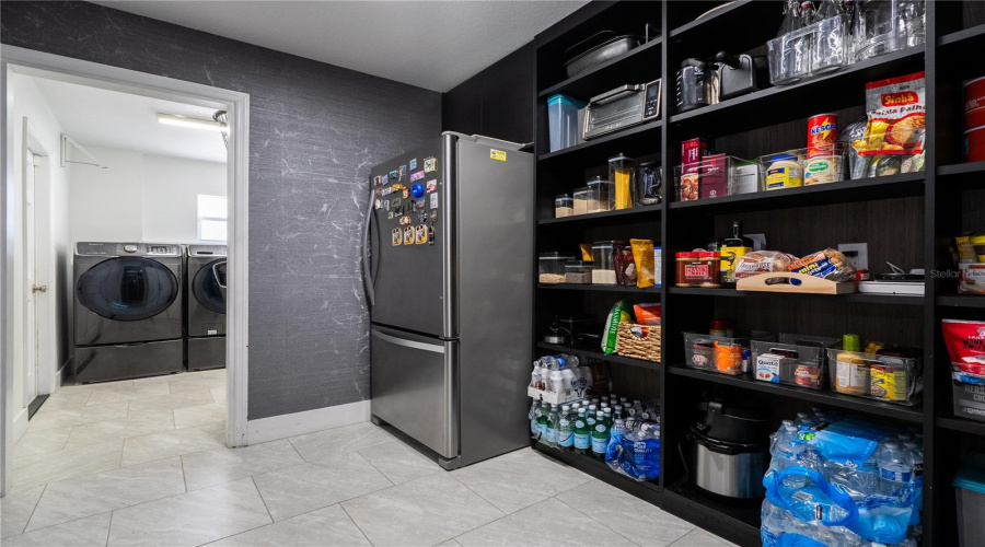 A super spacious pantry with it's own private fridge.
