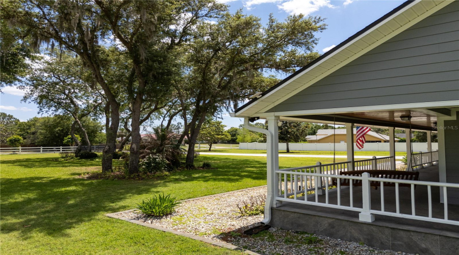 Charming farmhouse-style estate set on 2 private acres in the heart of Windermere.