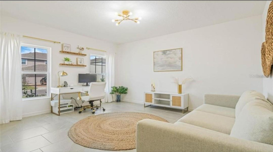 Bonus room by entry pictures are from when home was furnished