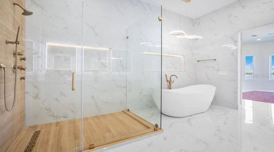 Primary Owner's Suite glass enclosure Shower