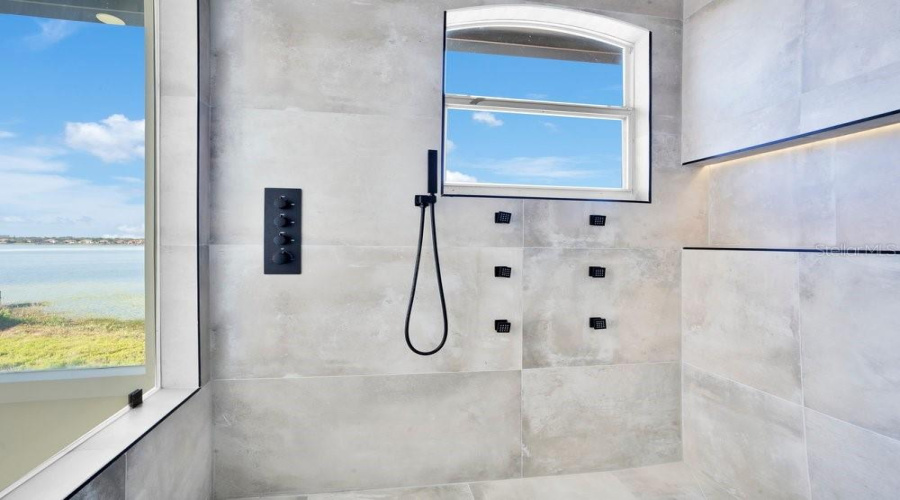 Secondary owner's Suite Shower with lake views