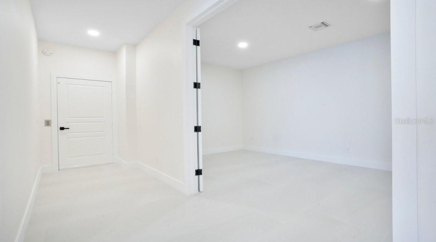 Lower Level Elevator & Exercise Room