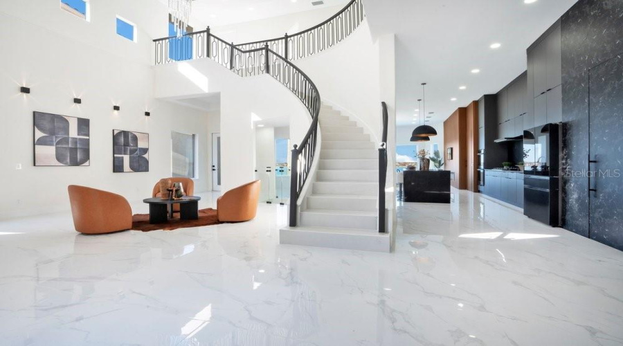 Foyer features Elegant curved Stairs