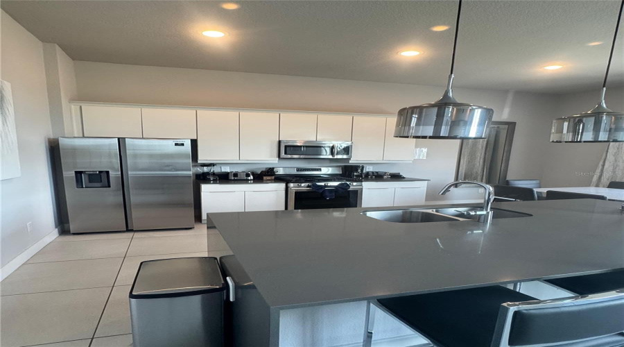 REUNION, Florida 34747, 5 Bedrooms Bedrooms, ,4 BathroomsBathrooms,Residential,For Sale,SANDY RIDGE,0,MFRO6402422