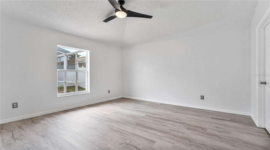 Bedroom 3 with NEW luxury vinyl flooring AND an EN SUITE BATHROOM