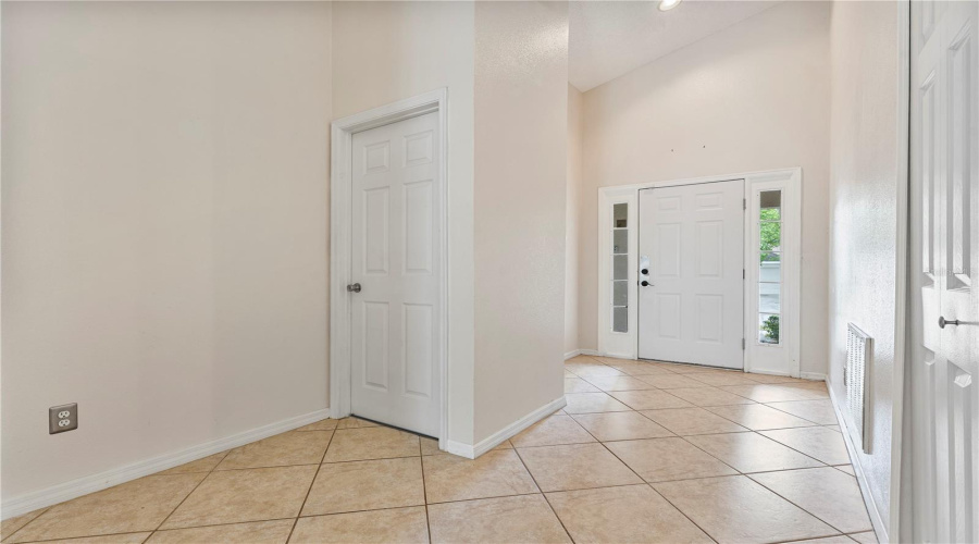Large foyer with tile floors