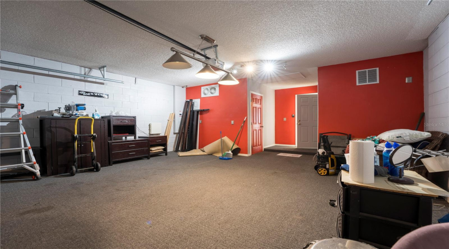 Large 2 car garage with access through the kitchen