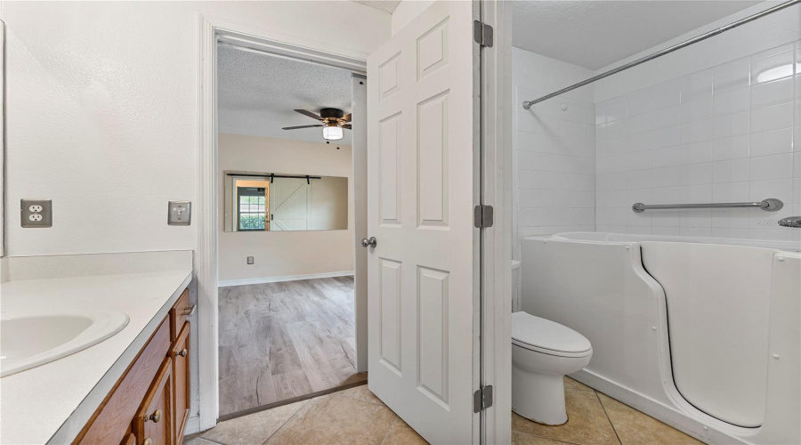 Jack and Jill Bathroom with walk in tub