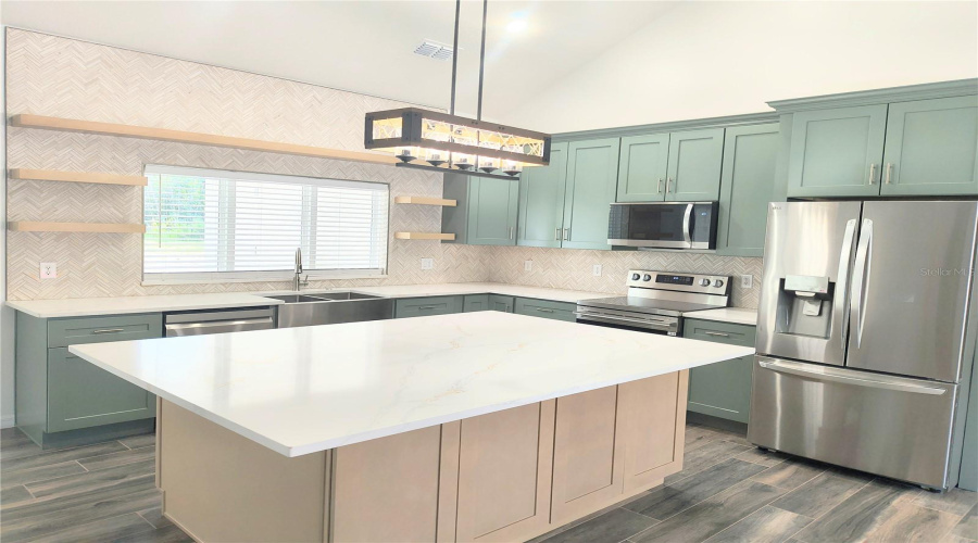 Island & windows looking out to rear yard