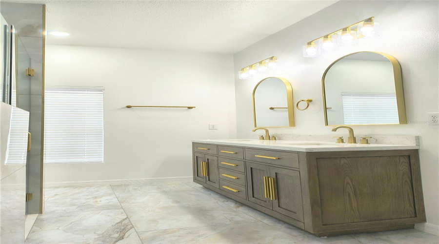 Primary bedroom double sink cabinet & mirrors