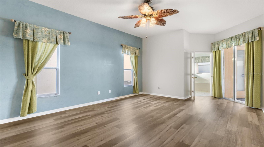 Primary Bedroom with entrance to pool