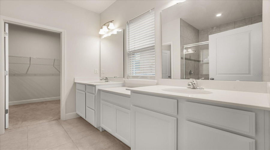 PRIMARY BATHROOM & WALK-IN CLOSET